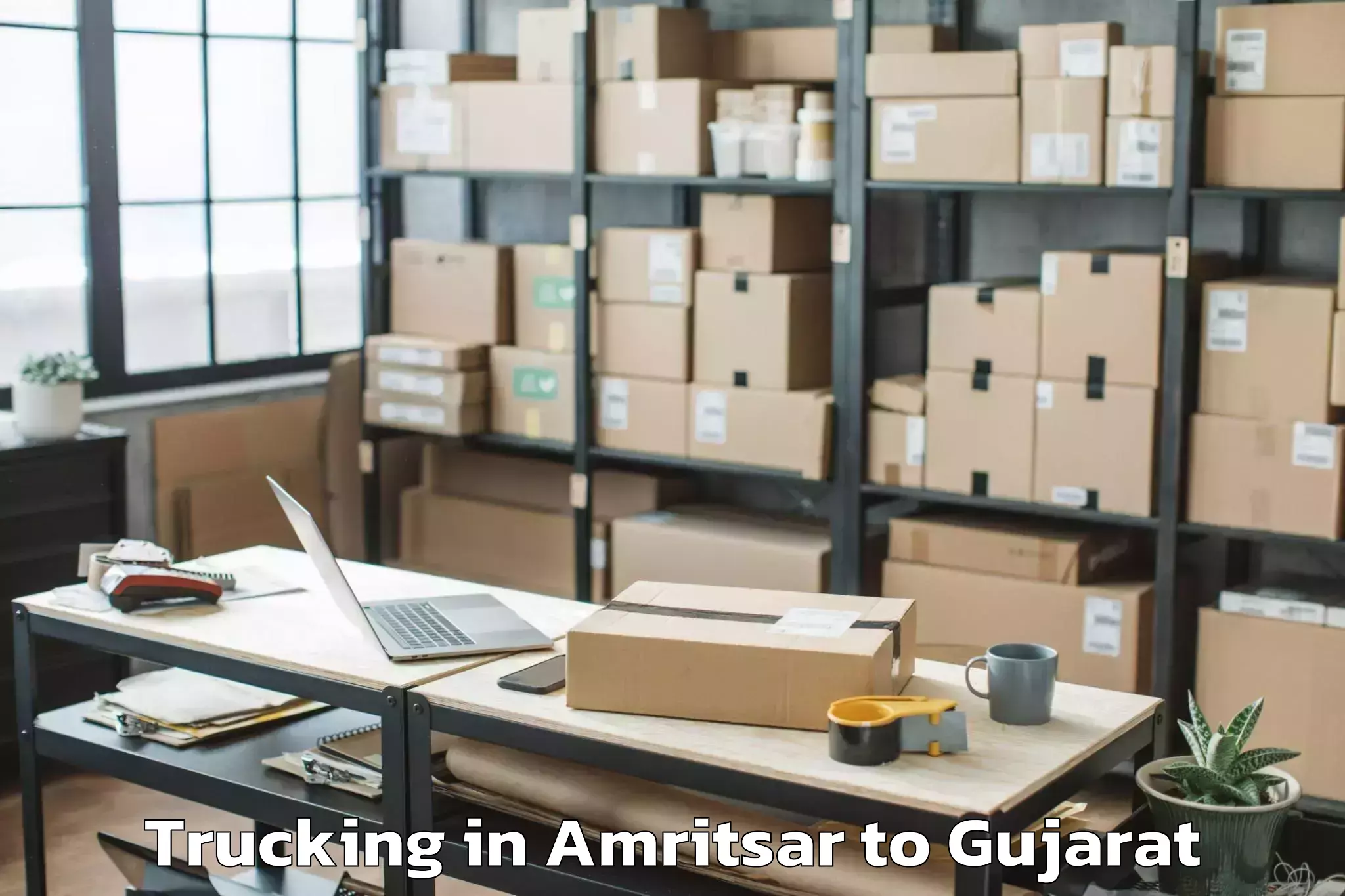 Reliable Amritsar to Limkheda Trucking